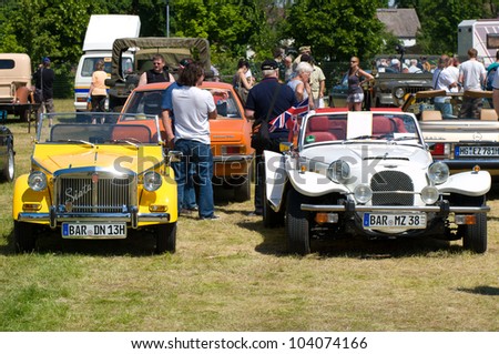 PAAREN IM GLIEN, GERMANY - MAY 26: Cars on the field, Fiat Siata Spring and Roadster Panther Kallista, \