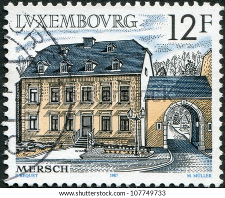 LUXEMBOURG - CIRCA 1987: A stamp printed in Luxembourg, shows Health Center, 18th century, Mersch, circa 1987