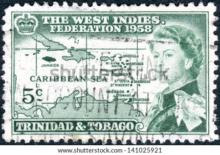 TRINIDAD AND TOBAGO - CIRCA 1958: A postage stamp printed in Trinidad and Tobago, is dedicated to the formation of the West Indian Federation, shows Queen Elizabeth II and Caribbean island, circa 1958