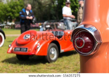 PAAREN IM GLIEN, GERMANY - MAY 19: The rear brake lights car Pontiac Star Chief, and in the background a BMW 328 Junior, \