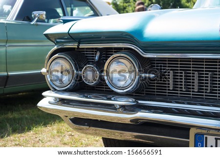 PAAREN IM GLIEN, GERMANY - MAY 19: Headlamp full-size car Oldsmobile 98 (Fifth generation), 