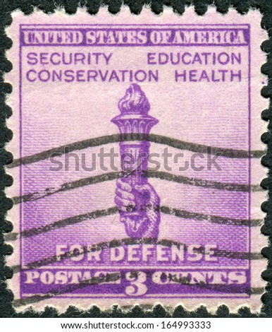 USA - CIRCA 1940: Postage stamp printed in the USA, National Defense Issue, shows Torch of Enlightenment, circa 1940