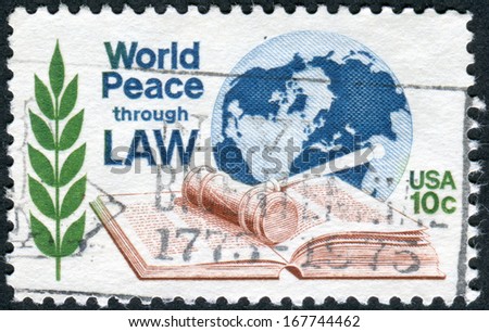 USA - CIRCA 1975: Postage stamp printed in the USA, World Peace Through Law Issue, shows Law Book, Olive Branch and Globe, circa 1975