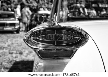 PAAREN IM GLIEN, GERMANY - MAY 19: The rear brake lights Full-size automobile Oldsmobile 98 (Ninety-Eight), black and white, The oldtimer show in MAFZ, May 19, 2013 in Paaren im Glien, Germany