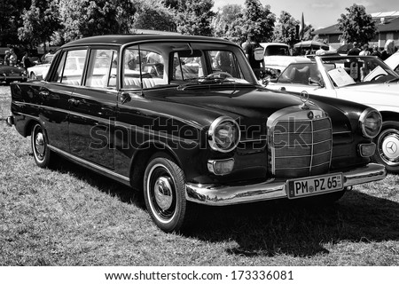 PAAREN IM GLIEN, GERMANY - MAY 19: Executive car Mercedes-Benz 190DC (W110 First Series), black and white, The oldtimer show in MAFZ, May 19, 2013 in Paaren im Glien, Germany
