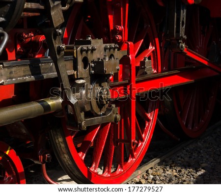 The wheels of the locomotive.