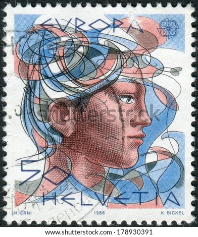 SWITZERLAND - CIRCA 1986: Postage stamp printed in Switzerland, dedicated to Europe, shows a woman's head, circa 1986