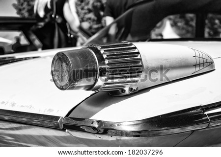 PAAREN IM GLIEN, GERMANY - MAY 19: The rear brake lights Full-size car Plymouth Fury, 1961 (black and white), \
