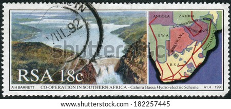 SOUTH AFRICA - CIRCA 1990: Postage stamp printed in South Africa, shows Cahora Bassa Dam and map landscape, circa 1990