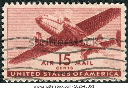 USA - CIRCA 1941: Postage stamp printed in USA, shows Twin-motored Transport Plane, circa 1941