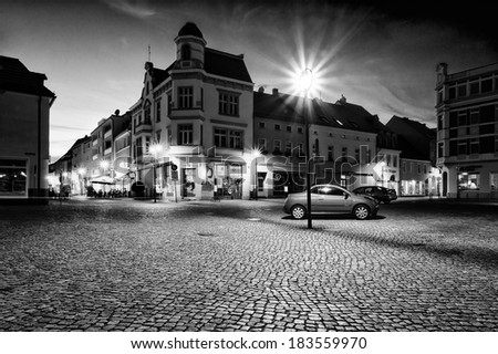 SENFENBERG, GERMANY - JULY 18: Market Square. The ancient city of Senftenberg. First mentioned in chronicles in 1276. Black and white. Styling. Large grains. July 18, 2013 Senftenberg, Germany
