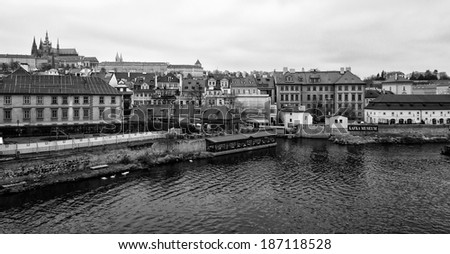 PRAGUE, CZECH REPUBLIC - FEBRUARY 02, 2014: View of old Prague and St. Vitus Cathedral. Black and White. Stylized film. Large grains