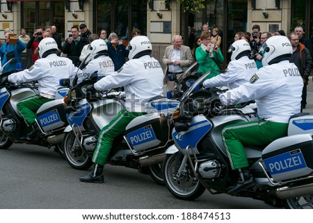 BERLIN, GERMANY - APRIL 11, 2014: Police escort on motorcycles. Ensuring the safety of VIPs.