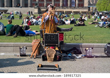 BERLIN, GERMANY - APRIL 19, 2014: Performance of a street performer. Indian music