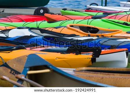 BERLIN, GERMANY - MAY 03, 2014: Sport boats, kayaks and canoes at the marina. Background. 2nd Berlin watersports festival in Gruenau, on the river Dahme tributary of the river Spree