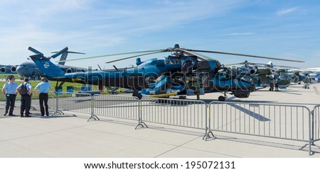 BERLIN, GERMANY - MAY 21, 2014: Attack helicopter with transport capabilities Mil Mi-24 Hind. Czech Air Force. Exhibition ILA Berlin Air Show 2014