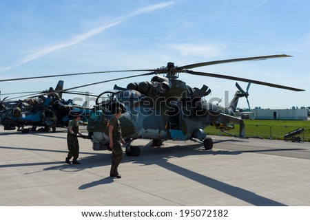 BERLIN, GERMANY - MAY 21, 2014: Attack helicopter with transport capabilities Mil Mi-24 Hind. Czech Air Force. Exhibition ILA Berlin Air Show 2014