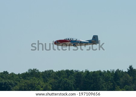 BERLIN, GERMANY - MAY 22, 2014: Demonstration flight of two-seat advanced jet trainer Hispano HA-200D Saeta, designed by Willy Messerschmitt. Spanish Air Force. Exhibition ILA Berlin Air Show 2014