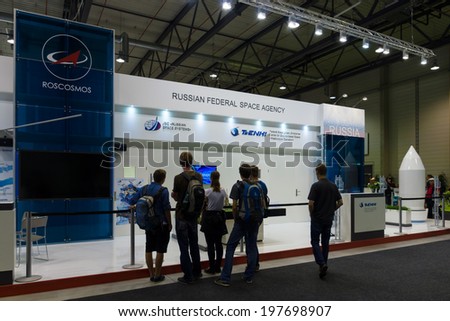 BERLIN, GERMANY - MAY 24, 2014: Stand Russian Federal Space Agency (Roscosmos). Space pavilion. Exhibition ILA Berlin Air Show 2014