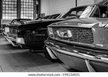 BERLIN, GERMANY - MAY 17, 2014: Ford Mustang and Dodge Charger. Black and white. 27th Oldtimer Day Berlin - Brandenburg