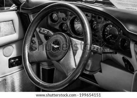 BERLIN, GERMANY - MAY 17, 2014: Interior of the driver\'s seat of the car Aston Martin V8 Volante. Black and white. 27th Oldtimer Day Berlin - Brandenburg