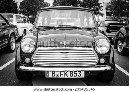 BERLIN, GERMANY - MAY 17, 2014: Small economy car Austin Mini Cooper. Black and white. 27th Oldtimer Day Berlin - Brandenburg