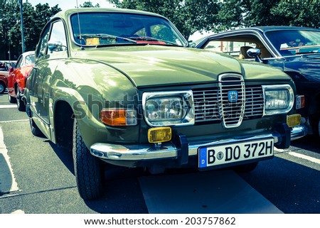 BERLIN, GERMANY - MAY 17, 2014: Compact car Saab 96. Toning. Imitation cross-process. 27th Oldtimer Day Berlin - Brandenburg