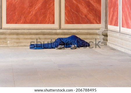 BERLIN, GERMANY - JUNE 06, 2014: Homeless people sleeping at the walls Altes Museum (Old Museum)