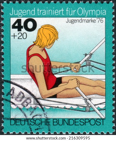 GERMANY - CIRCA 1976: Postage stamp printed in Germany, Issue: Youth training for the Olympics, depicts Rowing, single sculls, circa 1976