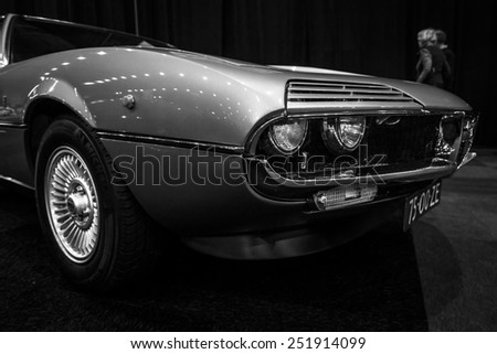 MAASTRICHT, NETHERLANDS - JANUARY 08, 2015: Sports car Alfa Romeo Montreal. Black and white. International Exhibition InterClassics & Topmobiel 2015