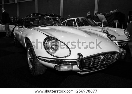 MAASTRICHT, NETHERLANDS - JANUARY 09, 2015: Sports car Jaguar E-Type S3, 1971. Black and white. International Exhibition InterClassics & Topmobiel 2015