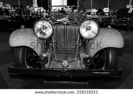 MAASTRICHT, NETHERLANDS - JANUARY 09, 2015: A sports car Jaguar SS1 Tourer, 1934. Black and white. International Exhibition InterClassics & Topmobiel 2015