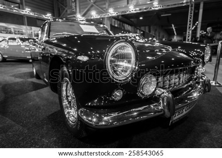 MAASTRICHT, NETHERLANDS - JANUARY 09, 2015: Sports car Ferrari 250GT/E, 1962. Black and white. International Exhibition InterClassics & Topmobiel 2015