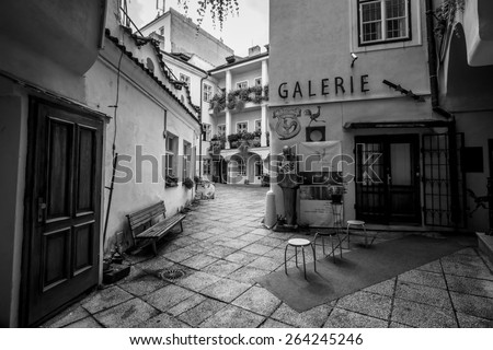 PRAGUE - SEPTEMBER 20, 2014: Street and everyday life of the city. Black and white. Prague is the capital and largest city of the Czech Republic.