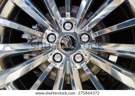 BERLIN - MAY 02, 2015: Showroom. Wheels and braking system of a large family car Skoda Superb (Third generation). Produced since 2015.