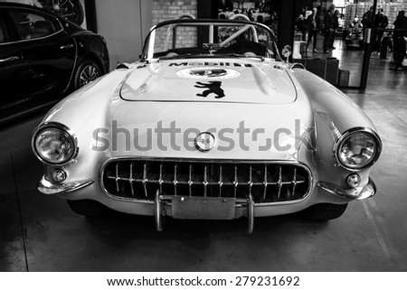 BERLIN - MAY 10, 2015: Sports car Chevrolet Corvette (C1) by Heidi Hetzer. Black and white. 28th Berlin-Brandenburg Oldtimer Day