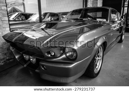 BERLIN - MAY 10, 2015: Shelby GT 500E Super Snake, 1968. Black and white. The Shelby is a higher performance variant of the Ford Mustang. 28th Berlin-Brandenburg Oldtimer Day