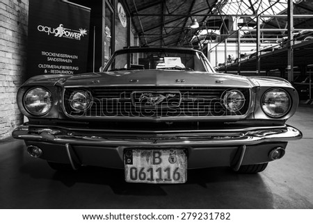 BERLIN - MAY 10, 2015: Pony car Ford Mustang (first generation). Black and white. 28th Berlin-Brandenburg Oldtimer Day