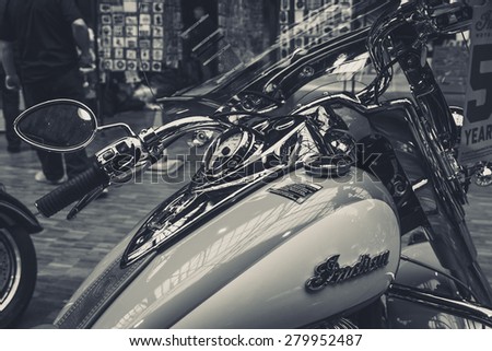 BERLIN - MAY 10, 2015: Fragment of a bike Indian Chief Classic close-up (2014-present). Black and white. Vintage toning. 28th Berlin-Brandenburg Oldtimer Day