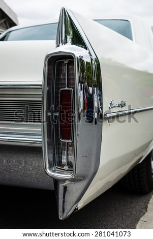 BERLIN - MAY 10, 2015: The rear brake lights full-size luxury car Cadillac Sedan De Ville. 28th Berlin-Brandenburg Oldtimer Day
