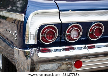 BERLIN - MAY 10, 2015: The rear brake lights of a full-size car Chevrolet Impala SS. 28th Berlin-Brandenburg Oldtimer Day