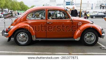 BERLIN - MAY 10, 2015: Subcompact, economy car Volkswagen Beetle. Side view. 28th Berlin-Brandenburg Oldtimer Day