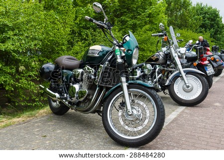 PAAREN IM GLIEN, GERMANY - MAY 23, 2015: Motorcycles Triumph Thunderbird (in foreground) and Harley-Davidson Fat Boy (in the background). The oldtimer show in MAFZ.