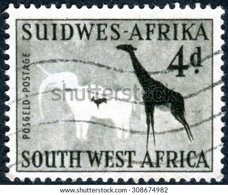 SOUTH-WEST AFRICA - CIRCA 1954: Postage stamp printed in South-West Africa, shows Elephant and giraffe, rock painting in the Phillips Cave, Erongo Mountains, circa 1954