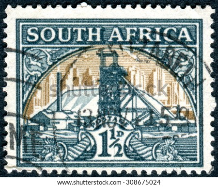 SOUTH AFRICA - CIRCA 1936: Postage stamp printed in South Africa, shows Gold Mine, circa 1936