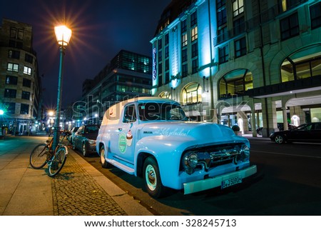 BERLIN, GERMANY - OCTOBER 13, 2015: Full-size pickup truck Ford F100 Panel Van, 1953 (second generation) on the night street. Ford F-Series - is a popular American pickup.