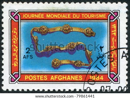 AFGHANISTAN - CIRCA 1984: A stamp printed in the Afghanistan devoted to World Tourism Day. Depicted Ornamental buckled harness, circa 1984