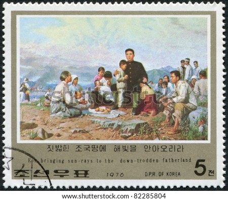 NORTH KOREA - CIRCA 1976: A stamp printed in North Korea on the history of the revolution, along with Kim Il-sung, is shown visiting farmers in the mountains, circa 1976