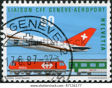 SWITZERLAND - CIRCA 1987: A stamp printed in Switzerland, shows a plane or train, airport Geneva, circa 1987