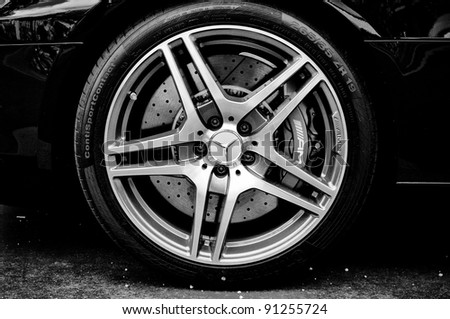 BERLIN - MAY 28: The wheel and brake disc supercar Mercedes-Benz SLS AMG (Black and White), the exhibition \